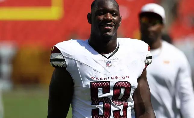 FILE - Washington Commanders linebacker T.J. Maguranyanga (59) looks on after an NFL football game against the Baltimore Ravens, Saturday, Aug. 23, 2025, in Landover. (AP Photo/Daniel Kucin Jr., File)