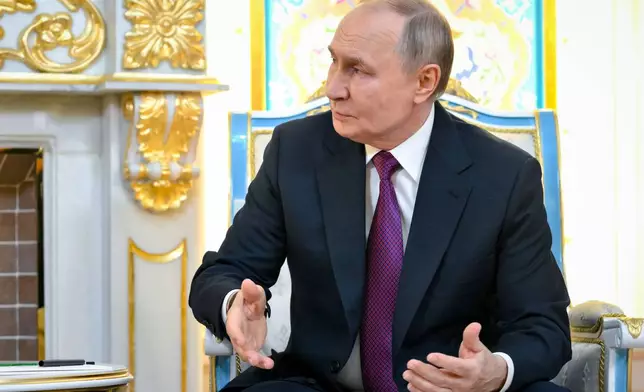 Russian President Vladimir Putin talks with Azerbaijan's President Ilham Aliyev during their meeting on the sidelines of the Russia-Central Asia summit in Dushanbe, Tajikistan, on Thursday, Oct. 9, 2025. (Grigory Sysoyev, Sputnik, Kremlin Pool Photo via AP)
