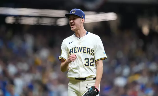 Milwaukee Brewers pitcher Jacob Misiorowski (32) reacts to an out against the Chicago Cubs during the fifth inning of Game 5 of baseball's National League Division Series, Saturday, Oct. 11, 2025, in Milwaukee. (AP Photo/Kayla Wolf)