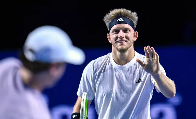 Spain's Alejandro Davidovich Fokina smiles during the final match against Brazil's Joao Fonseca at the Swiss Indoors tennis tournament in Basel, Switzerland, Sunday, Oct. 26, 2025. (Georgios Kefalas/Keystone via AP)