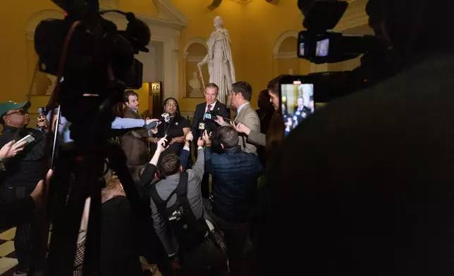 Del. Cia Price, D-Newport News, and Del. Rodney Willett, D-Henrico, right, speak to members of the media during a special legislative session, Monday, Oct. 27, 2025, in Richmond, Va. (Mike Kropf/Richmond Times-Dispatch via AP)