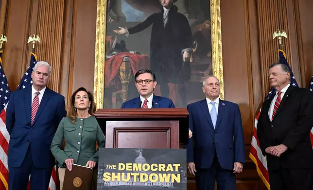 From left, House Majority Whip Tom Emmer, R-Minn., Chair of the House Republican Conference, Rep. Lisa McClain, R-Mich., Speaker of the House Mike Johnson, R-La., House Majority Leader Steve Scalise, R-La., and Chairman of the House Committee on Appropriations, Tom Cole, R-Okla., during a press conference on the 8th day of the government shutdown at the U.S. Capitol on Wednesday, Oct. 8, 2025, in Washington. (AP Photo/John McDonnell)