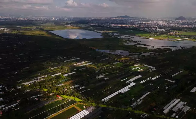 Floating islands known as chinampas are visible in San Gregorio Atlapulco and Xochimilco, boroughs of Mexico City, Sept. 20, 2025. (AP Photo/Felix Marquez)