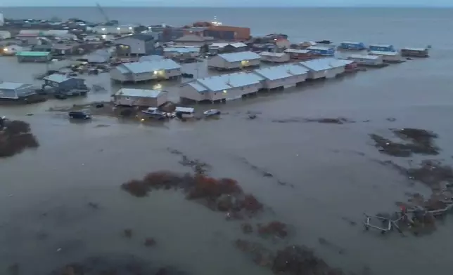 In this aerial photo provided by the Alaska Department of Transportation and Public Facilities, the city of Kotzebue, Alaska, experiences flooding, Wednesday, Oct. 8, 2025. (Alaska Department of Transportation and Public Facilities via AP)