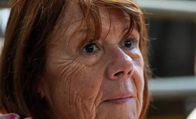 Gisele Pelicot sits in the courtroom during the appeals trial in the case of a man challenging his conviction, less than a year after the landmark verdict in a drugging and rape trial that shook France Thursday, Oct. 9, 2025 in Nimes, southern France. (AP Photo/Lewis Joly)