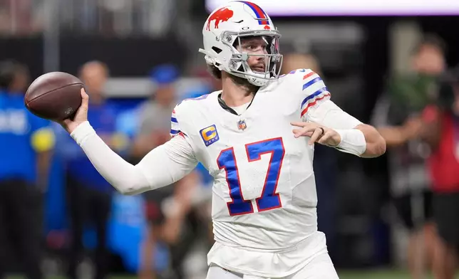 Buffalo Bills quarterback Josh Allen (17) throws a pass during the first half of an NFL football game against the Atlanta Falcons, Monday, Oct. 13, 2025, in Atlanta. (AP Photo/Mike Stewart)