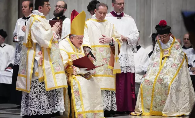 Cardinal Raymond Leo Burke, sitting, delivers a speech as he celebrates the old Latin Mass for pilgrim in St. Peter's Basilica, at the Vatican, Saturday, Oct. 25, 2025. (AP Photo/Alessandra Tarantino)