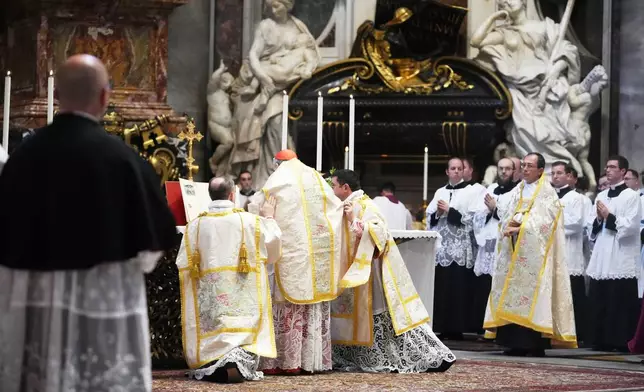 Cardinal Raymond Leo Burke celebrates an old Latin Mass for pilgrims in St. Peter's Basilica, at the Vatican, Saturday, Oct. 25, 2025. (AP Photo/Alessandra Tarantino)