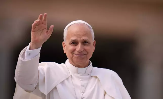 Pope Leo XIV holds an audience with pilgrims of the Diocesan Jubilee in St. Peter's Square, at the Vatican, Saturday, Oct. 25, 2025. (AP Photo/Alessandra Tarantino)