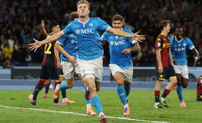 Napoli's Rasmus Hojlund celebrates after scoring during the Italian Serie A soccer match between Napoli and Genoa at the Diego Armando Maradona Stadium in Naples, Italy, Sunday, Oct. 5 , 2025. (Alessandro Garofalo/LaPresse via AP)