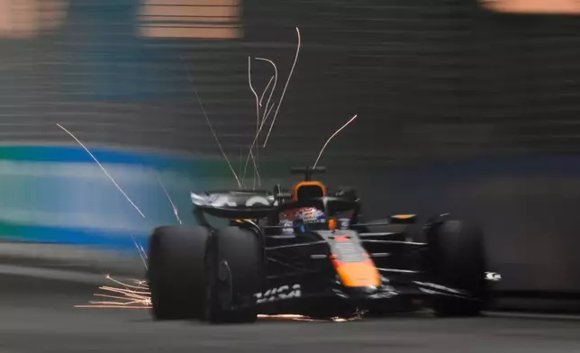 Red Bull driver Max Verstappen of the Netherlands in action during the qualifying for the Singapore Formula One Grand Prix at the Marina Bay Street Circuit in Singapore, Saturday, Oct. 4, 2025. (AP Photo/Vincent Thian)