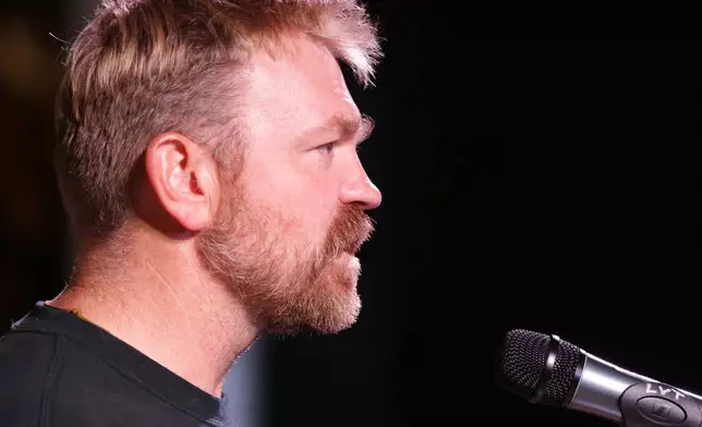 Democratic Maine Senate candidate Graham Platner speaks at a town hall in Ogunquit, Maine, Wednesday, Oct. 22, 2025. (AP Photo/Caleb Jones)