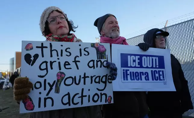 Protesters gather outside an ICE processing facility in Broadview, Ill., a suburb of Chicago, Friday, Oct. 24, 2025. (AP Photo/Nam Y. Huh)