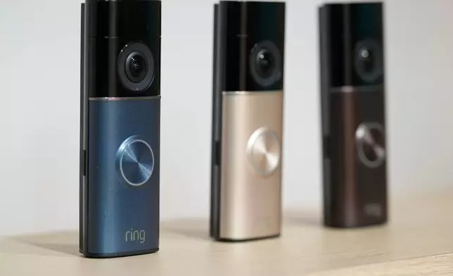 New ring doorbells are displays during an Amazon event in New York, Tuesday, Sept. 30, 2025. (AP Photo/Seth Wenig)