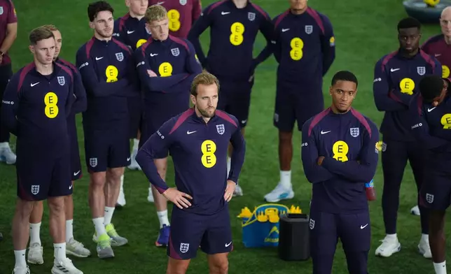 England Harry Kane, centre, and teammates attend a training session at St George's Park, Burton upon Trent, England, Monday Oct. 6, 2025. (Martin Rickett/PA via AP)