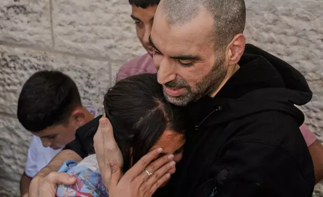 A Palestinian prisoner who was released from an Israeli prison as part of a ceasefire deal between Israel and Hamas, upon his arrival in the West Bank city of Ramallah, Monday, Oct. 13, 2025. (AP Photo/Majdi Mohammed)