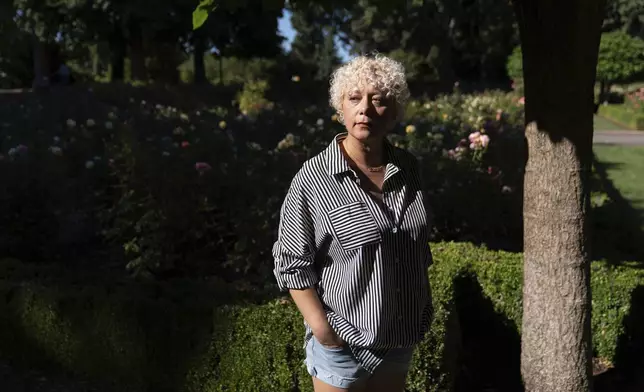 Brianna Wheeler poses for a photo at Peninsula Park, Monday, Sept. 22, 2025, in Portland, Ore. (AP Photo/Jenny Kane)