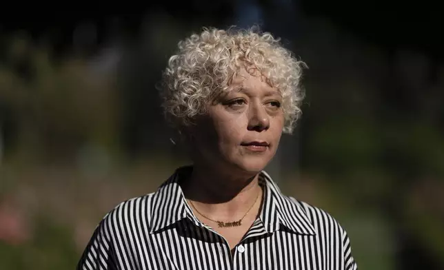 Brianna Wheeler poses for a photo at Peninsula Park, Monday, Sept. 22, 2025, in Portland, Ore. (AP Photo/Jenny Kane)