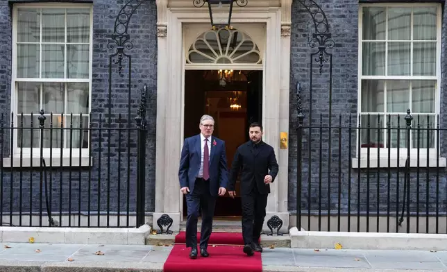 Britain's Prime Minister Keir Starmer and Ukraine's President Volodymyr Zelenskyy leave 10 Downing Street in London, Friday, Oct. 24, 2025 for a meeting of the so-called "coalition of the willing".(AP Photo/Kirsty Wigglesworth)