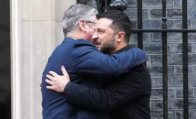 Britain's Prime Minister Keir Starmer welcomes Ukraine's President Volodymyr Zelenskyy to 10 Downing Street in London, Friday, Oct. 24, 2025 for a later meeting of the so-called "coalition of the willing".(AP Photo/Kirsty Wigglesworth, Pool)