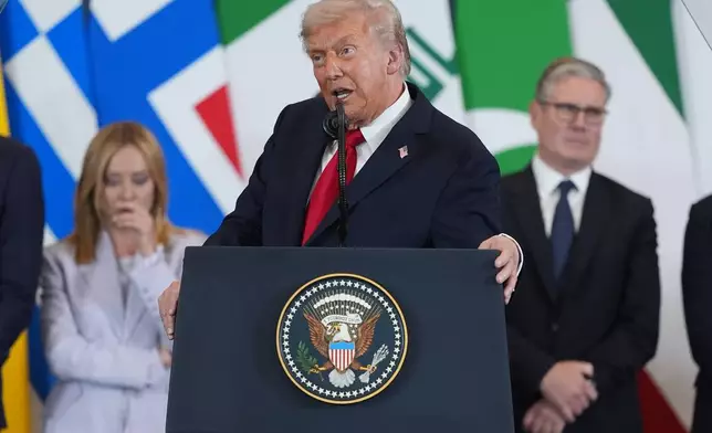 President Donald Trump speaks during a summit to support ending the more than two-year Israel-Hamas war in Gaza after a breakthrough ceasefire deal, Monday, Oct. 13, 2025, in Sharm El Sheikh, Egypt, as Italy's Prime Minister Giorgia Meloni and Britain's Prime Minister Keir Starmer listen. (AP Photo/Evan Vucci)