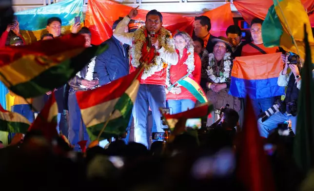 Presidential candidate Rodrigo Paz addresses supporters after preliminary results showed him leading in the presidential runoff election in La Paz, Bolivia, Sunday, Oct. 19, 2025. (AP Photo/Ivan Valencia)