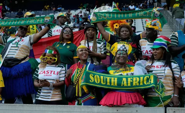 South Africa fans wait for the start of a World Cup 2026 group C qualifying soccer match between South Africa and Rwanda at Mbombela Stadium, in Nelspruit, South Africa, Tuesday, Oct. 14, 2025. (AP Photo/Themba Hadebe)