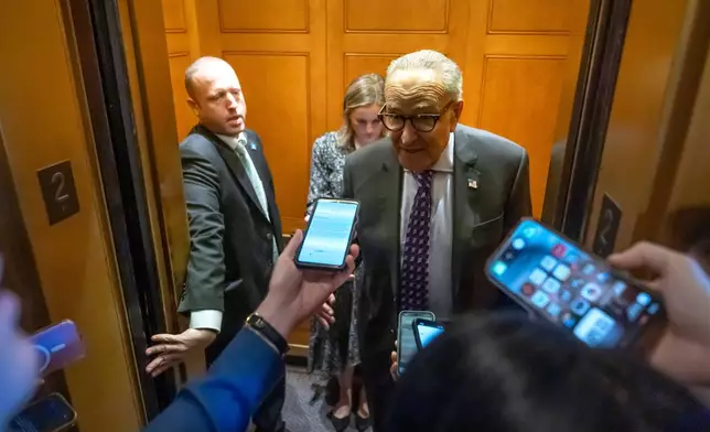 Senate Minority Leader Chuck Schumer, of N.Y., speaks to reporters at the Capitol on Wednesday, Oct. 1, 2025, in Washington. (AP Photo/Mark Schiefelbein)