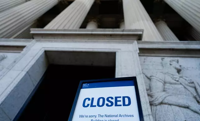 A closed sign stands in front of the National Archives on the first day of a government shutdown, Wednesday, Oct. 1, 2025, in Washington. (AP Photo/Julia Demaree Nikhinson)
