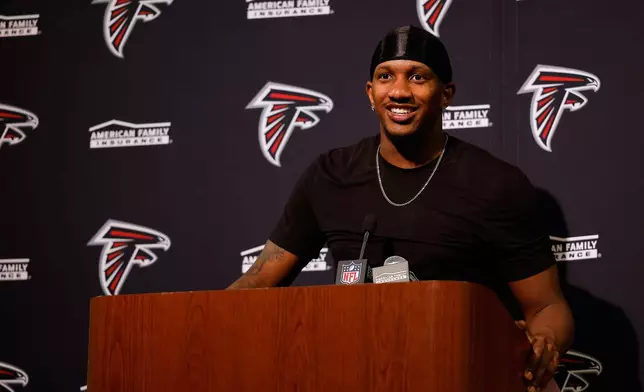 Atlanta Falcons quarterback Michael Penix Jr. speaks to reporters after an NFL football game against the San Francisco 49ers, Sunday, Oct. 19, 2025, in Santa Clara, Calif. (AP Photo/Kelley L Cox)