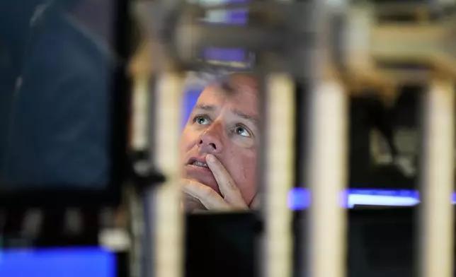 John O'Hara works on the floor at the New York Stock Exchange in New York, Wednesday, Oct. 1, 2025. (AP Photo/Seth Wenig)