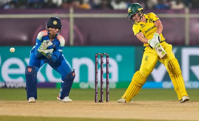 Australia's captain Alyssa Healy plays a shot during the ICC Women's Cricket World Cup match between India and Australia at ACA-VDCA Cricket Stadium in Visakhapatnam, India, Sunday, Oct. 12, 2025. (AP Photo/Aijaz Rahi)