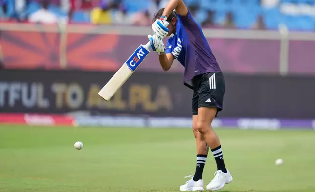 India's captain Harmanpreet Kaur trains ahead of the ICC Women's Cricket World Cup match between India and Australia at ACA-VDCA Cricket Stadium in Visakhapatnam, India, Sunday, Oct. 12, 2025. (AP Photo/Aijaz Rahi)