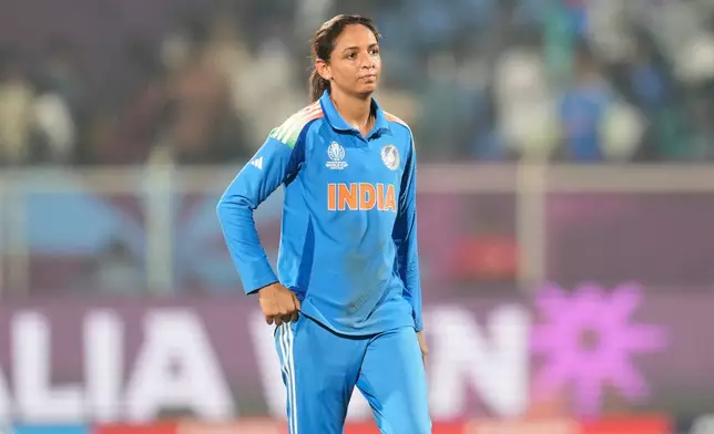 India's captain Harmanpreet Kaur leaves the field after their loss in the ICC Women's Cricket World Cup match against Australia at ACA-VDCA Cricket Stadium in Visakhapatnam, India, Sunday, Oct. 12, 2025. (AP Photo/Aijaz Rahi)