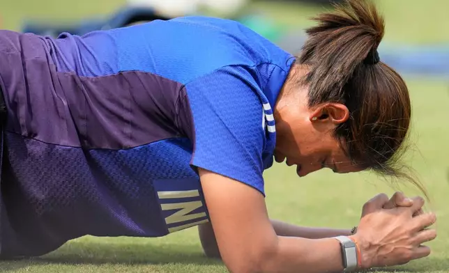 India's captain Harmanpreet Kaur trains ahead of the ICC Women's Cricket World Cup match between India and Australia at ACA-VDCA Cricket Stadium in Visakhapatnam, India, Sunday, Oct. 12, 2025. (AP Photo/Aijaz Rahi)