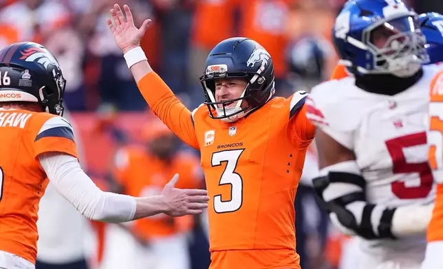 Denver Broncos kicker Wil Lutz (3) celebrates after kicking the game winning field goal during the second half of an NFL football game against the New York Giants in Denver, Sunday, Oct. 19, 2025. (AP Photo/David Zalubowski)