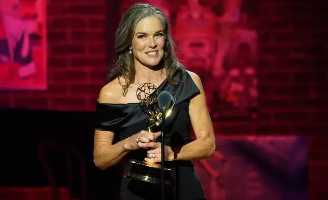 Actor Susan Walters accepts the award for Oustanding Supporting Actress in a Daytime Drama Series for her performance in "The Young and the Restless" during the 52nd Annual Daytime Emmy Awards on Friday, Oct. 17, 2025, at Pasadena Civic Auditorium in Pasadena, Calif. (AP Photo/Chris Pizzello)