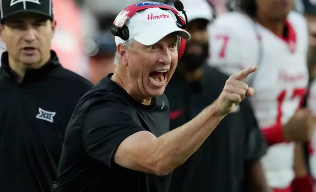 Houston head coach Willie Fritz celebrates a touchdown against Arizona State during the first half of an NCAA college football game Saturday, Oct. 25, 2025, in Tempe, Ariz. (AP Photo/Ross D. Franklin)