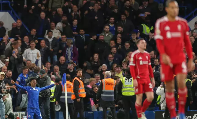 Chelsea's Estevao celebrates after scoring his side's second goal during the English Premier League soccer match between Chelsea and Liverpool at Stamford Bridge in London, Saturday, Oct. 4, 2025. (AP Photo/Ian Walton)