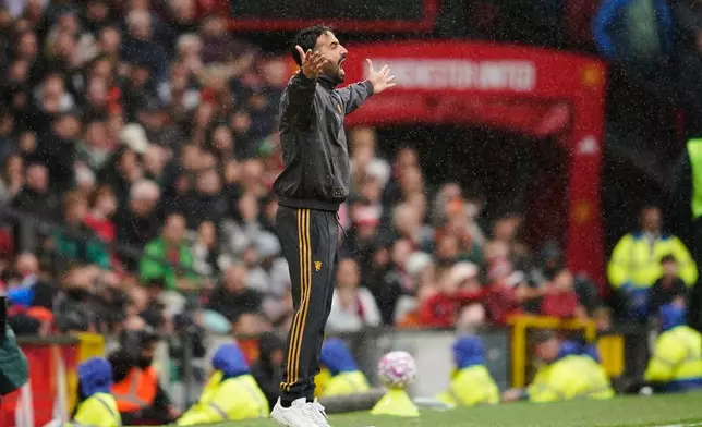 Manchester United's head coach Ruben Amorim reacts during the English Premier League soccer match between Manchester United and Sunderland at Old Trafford stadium in Manchester, England, Saturday, Oct. 4, 2025. (AP Photo/Dave Thompson)