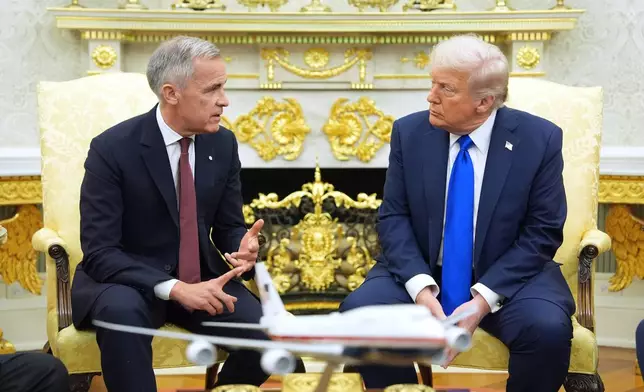 Canadian Prime Minister Mark Carney speaks during a meeting with President Donald Trump at the White House, Tuesday, Oct. 7, 2025, in Washington. (AP Photo/Evan Vucci) Washington. (AP Photo/Evan Vucci)