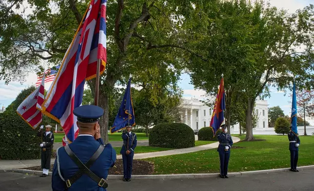 An honor guard prepares for the arrival of Canada's Prime Minister Mark Carney to the White House, Tuesday, Oct. 7, 2025, in Washington. (AP Photo/Jacquelyn Martin)