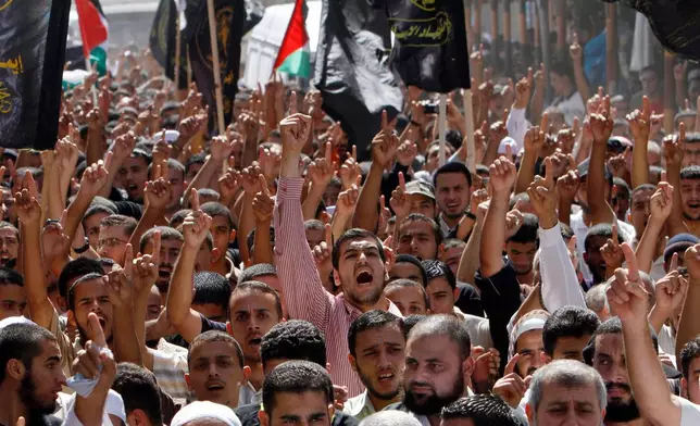 FILE - Palestinian supporters of Islamic Jihad participate in a rally marking 10 years since the starting of the second Intifada, in Khan Younis, southern Gaza Strip, Oct. 1, 2010. (AP Photo/Adel Hana, File)