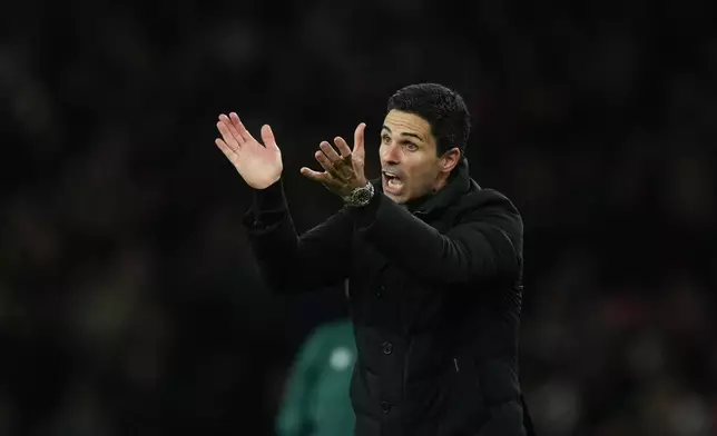 Arsenal's manager Mikel Arteta reacts during the Champions League opening phase soccer match between Arsenal and Atletico Madrid in London, England, Tuesday, Oct. 21, 2025. (AP Photo/Alastair Grant)