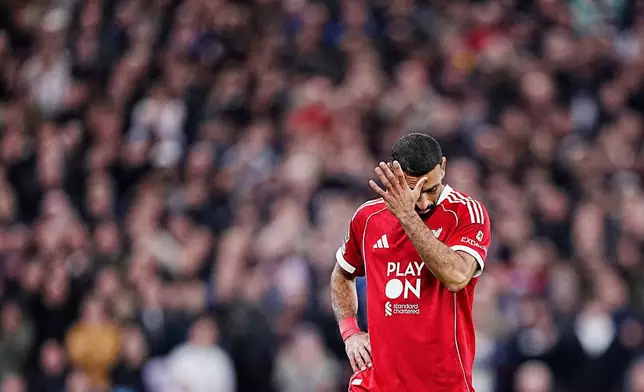 Liverpool's Mohamed Salah reacts during the English Premier League soccer match between Liverpool and Manchester United in Liverpool, England, Sunday, Oct. 19, 2025. (Peter Byrne/PA via AP)