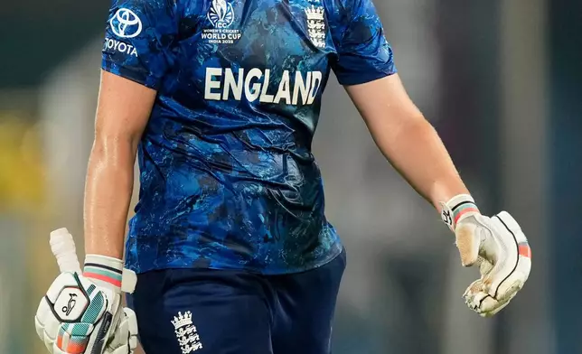 England's captain Nat Sciver-Brunt walks off the field after losing her wicket during the ICC Women's Cricket World Cup first semifinal match between England and South Africa at Barsapara Cricket Stadium in Guwahati, India, Thursday, Oct. 29, 2025. (AP Photo/Anupam Nath)