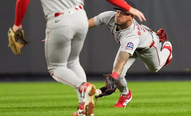 Boston Red Sox centerfielder Ceddanne Rafaela (3) can't come up with the catch on a shallow pop up by New York Yankees Cody Bellinger during the fourth inning of Game 3 of an American League wild-card baseball playoff series, Thursday, Oct. 2, 2025, in New York. (AP Photo/Frank Franklin II)