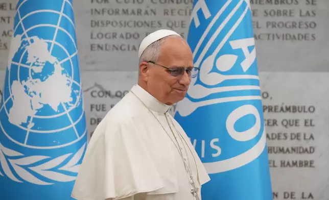 Pope Leo XIV leaves the Global World Food Day Ceremony in Rome, Thursday, Oct. 16, 2025. (AP Photo/Alessandra Tarantino)