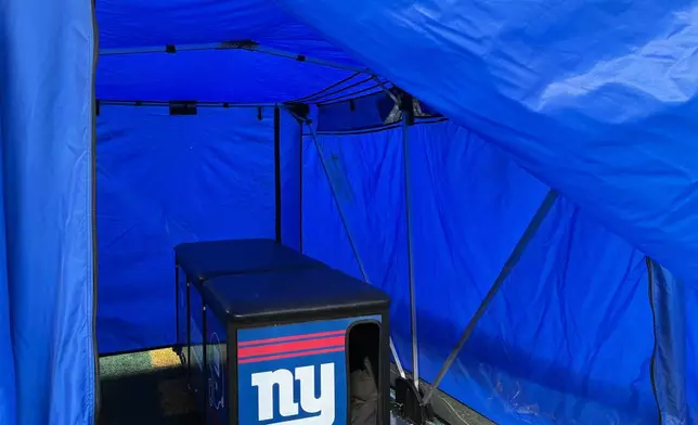 A blue medical tent is viewed Thursday, Oct. 9, 2025, at MetLife Stadium in East Rutherford, N.J. (AP Photo/Stephen Whyno)
