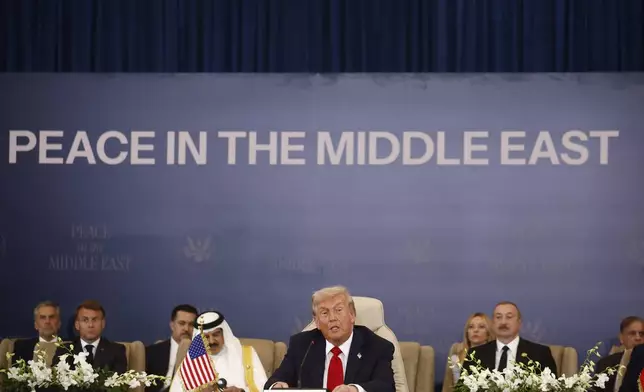 President Donald Trump attends the signature ceremony at the Gaza International Peace Summit, in Sharm el-Sheikh, Egypt, Monday, Oct.13 2025. (Yoan Valat, Pool photo via AP)